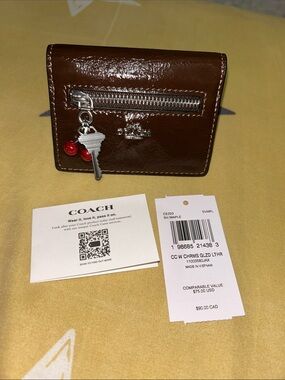 Coach Maple Brown Patent Leather Mini Wallet with Red Charm
